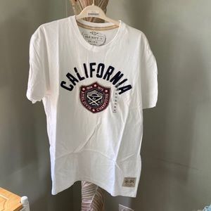 California tee, never worn with tags, 100% cotton, embroidered letters/emblem